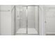 Bathroom featuring a glass shower and ceramic tile at 3727 Rosebush Dr, Zebulon, NC 27597
