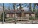 Charming single-story home featuring red shutters, and a brick chimney at 3817 Nc-119, Mebane, NC 27302