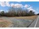 View of the long driveway leading to the entrance of the property at 3817 Nc-119, Mebane, NC 27302