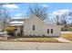 Charming single Gathering home featuring a well-manicured lawn and inviting front entrance with brick steps at 410 N Lamar St, Roxboro, NC 27573