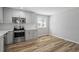 Contemporary kitchen featuring stainless appliances and sleek countertops at 410 N Lamar St, Roxboro, NC 27573