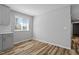 A cozy dining nook with natural light, stylish floors, and neutral paint, perfect for casual meals at 410 N Lamar St, Roxboro, NC 27573