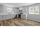 Modern kitchen with stainless steel appliances and stylish white subway tile at 410 N Lamar St, Roxboro, NC 27573