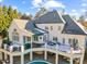 Aerial view showcasing the expansive deck and patio area ideal for outdoor entertaining at 4708 Wynneford Way, Raleigh, NC 27614