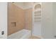 Bathroom with built-in tub and tile shower at 4708 Wynneford Way, Raleigh, NC 27614
