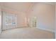 Bedroom with high ceilings and large windows at 4708 Wynneford Way, Raleigh, NC 27614