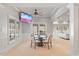 Cozy breakfast nook with natural light, a ceiling fan and a mounted TV at 4708 Wynneford Way, Raleigh, NC 27614