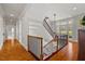 Grand foyer with hardwood floors and elegant staircase at 4708 Wynneford Way, Raleigh, NC 27614