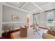 Elegant living room with coffered ceilings, hardwood floors, and stylish decor at 4708 Wynneford Way, Raleigh, NC 27614