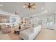 Spacious living area with bar, access to outdoor spaces, and comfortable seating at 4708 Wynneford Way, Raleigh, NC 27614