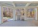Outdoor kitchen area with built-in grill and bar at 4708 Wynneford Way, Raleigh, NC 27614