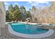 Backyard pool featuring an attached spa at 4708 Wynneford Way, Raleigh, NC 27614
