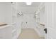 Large walk-in closet with custom shelving at 4708 Wynneford Way, Raleigh, NC 27614