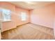 Bedroom with neutral carpet, two windows, and freshly painted walls at 5161 Church Rd # 17, New Hill, NC 27562