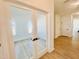 Bright office with glass French doors offers an inviting workspace and view into the main space of this new home at 5161 Church Rd # 17, New Hill, NC 27562