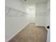 Walk-in closet with carpeted flooring and wire shelving for optimal storage at 5161 Church Rd # 17, New Hill, NC 27562