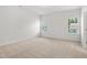 Bright and spacious bedroom with neutral carpet at 60 Commons Cir, Clayton, NC 27520