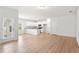 Bright, open floorplan with a view of the kitchen with stainless steel appliances at 60 Commons Cir, Clayton, NC 27520