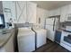 Bright kitchen featuring appliances, sleek countertops, and ample storage space at 606 N Orange Ave, Dunn, NC 28334
