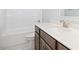 Bathroom featuring a tub, toilet and vanity with stone countertop at 618 Tart Town Rd, Dunn, NC 28334