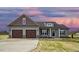 Charming new construction home featuring a two-car garage and neutral siding at 618 Tart Town Rd, Dunn, NC 28334
