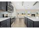 Contemporary kitchen featuring stainless steel appliances, white countertops, and an island at 618 Tart Town Rd, Dunn, NC 28334