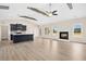 Bright living space featuring an open-concept design with kitchen and fireplace at 618 Tart Town Rd, Dunn, NC 28334