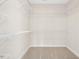 Spacious walk-in closet featuring wire shelving and carpet flooring at 618 Tart Town Rd, Dunn, NC 28334