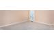Bright bedroom featuring soft carpet flooring and natural light from the window at 748 Weathergreen Dr, Raleigh, NC 27615