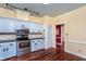 Modern kitchen featuring ample countertop space and a seamless flow to other rooms at 748 Weathergreen Dr, Raleigh, NC 27615