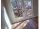 A close up of the double-door access to a wooden outdoor balcony at 806 Kendall Dr, Durham, NC 27703