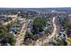 Overhead view of a residential area highlighting well-maintained homes, tree-lined streets, and natural surroundings at 857 Stroud Cir, Wake Forest, NC 27587
