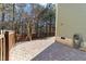 Paved patio area with privacy fence, perfect for outdoor gatherings at 857 Stroud Cir, Wake Forest, NC 27587