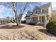 Inviting two-story home with a covered front porch and mature landscaping in a suburban setting at 857 Stroud Cir, Wake Forest, NC 27587