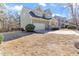 Well-maintained home with a green lawn, a two-car garage, and a cozy, inviting facade at 857 Stroud Cir, Wake Forest, NC 27587