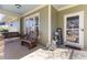Relaxing covered front porch with rocking chair, swing, and charming decor at 857 Stroud Cir, Wake Forest, NC 27587
