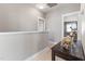 Upstairs hallway with neutral paint, carpet flooring, and attractive decor at 857 Stroud Cir, Wake Forest, NC 27587