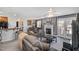 Spacious living area with a fireplace, comfortable seating, and an open layout leading to the dining area at 1001 Strobus Ct, Wendell, NC 27591