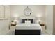 Contemporary bedroom with minimalist decor, cozy lighting, and serene ambiance at 1012 Aspen View Dr, Raleigh, NC 27610