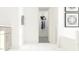 Bright hallway leading to a closet, enhancing the home's spacious layout at 1205 Jade Valley Trl, Raleigh, NC 27610