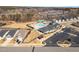 Community aerial view showcasing the clubhouse, swimming pool, and surrounding neighborhood homes and the convenient parking lot at 130 Ivory Ln, Raleigh, NC 27610