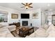 Inviting living room with hardwood floors, fireplace, ceiling fan and neutral decor at 130 Ivory Ln, Raleigh, NC 27610