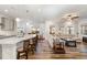 Open-concept living space that connects the kitchen, dining area, and living room at 130 Ivory Ln, Raleigh, NC 27610