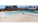 Community swimming pool with clearly marked lanes, ample deck space, and beach-style zero-entry access at 130 Ivory Ln, Raleigh, NC 27610