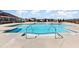 View of the large community swimming pool and pool deck with multiple access points and in-pool seating at 130 Ivory Ln, Raleigh, NC 27610