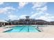 Large community swimming pool with clearly marked lanes and multiple access points near the community building at 130 Ivory Ln, Raleigh, NC 27610