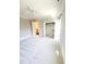 Carpeted bedroom features a closet, a doorway to another room, and a ceiling fan at 1317 Pecora Ln, Raleigh, NC 27607