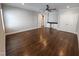 Spacious bedroom showcasing hardwood floors, a ceiling fan, and a built-in desk area at 1317 Pecora Ln, Raleigh, NC 27607