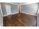 Spacious bedroom featuring hardwood floors and a tray ceiling at 1317 Pecora Ln, Raleigh, NC 27607
