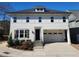Charming two-story home features a two-car garage, manicured landscaping, and a welcoming entryway at 1317 Pecora Ln, Raleigh, NC 27607
